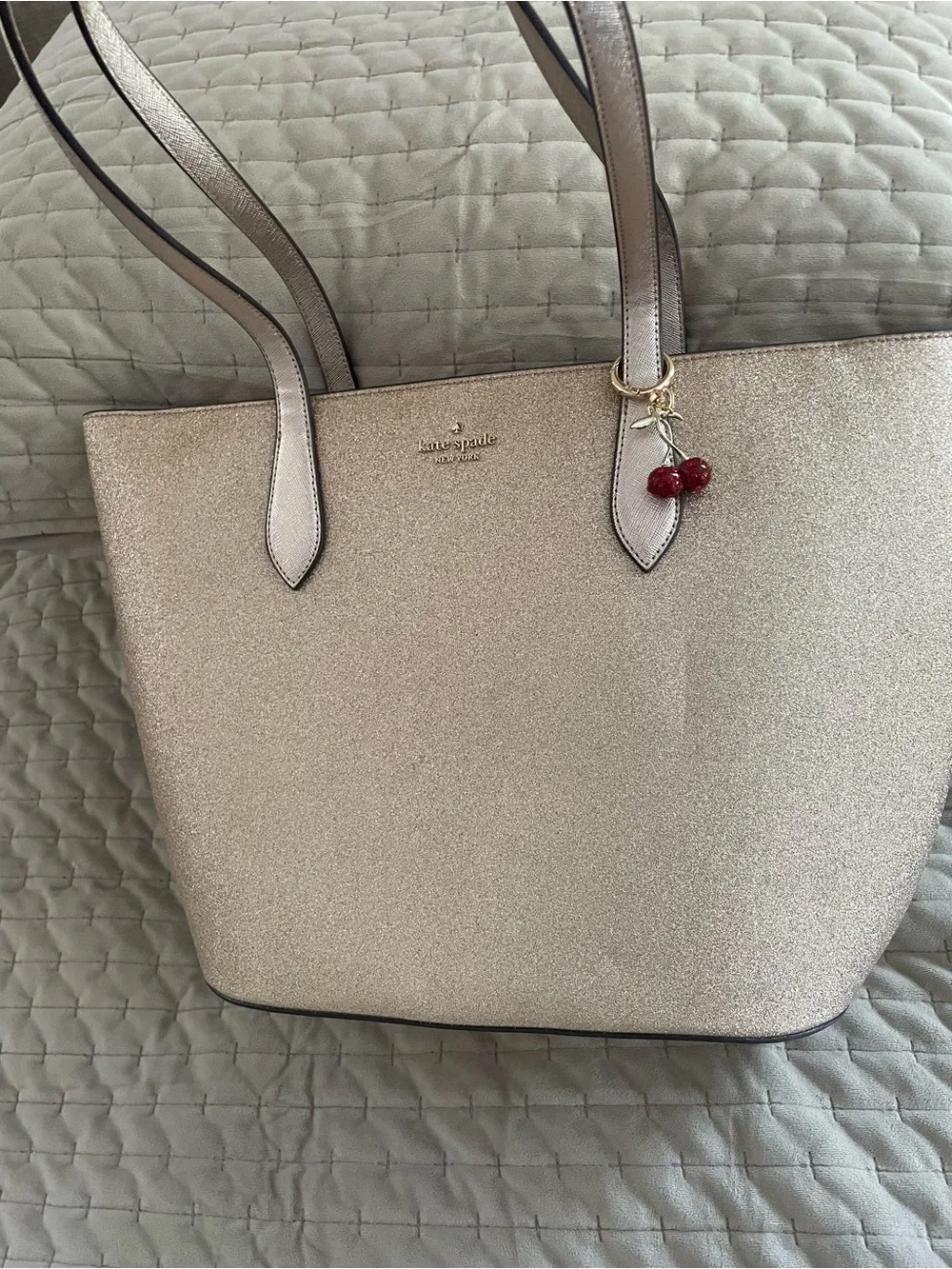 kate spade Metallic Champagne Glitter Tote with Cherry Charm